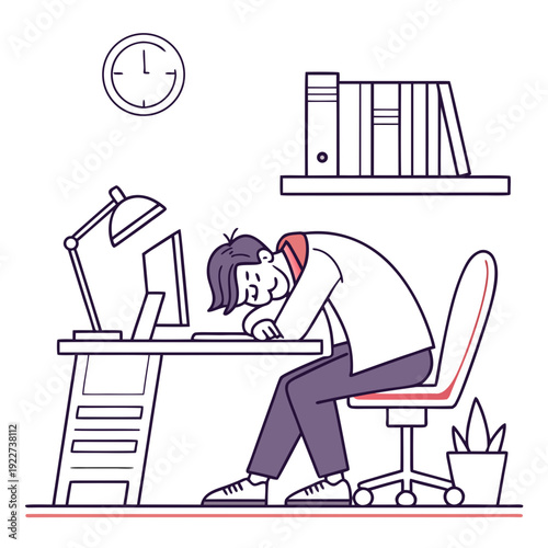 A man sitting at a desk looking tired