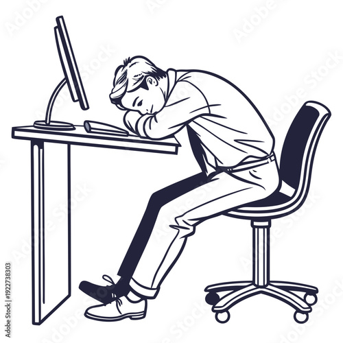 A man sitting at a desk looking tired