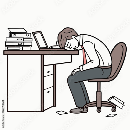 A man sitting at his desk looking very tired