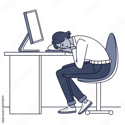 A man sitting at a desk looking stressed