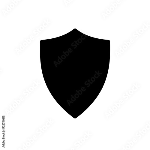 A classic black silhouette of a shield emblem with pointed top and rounded base