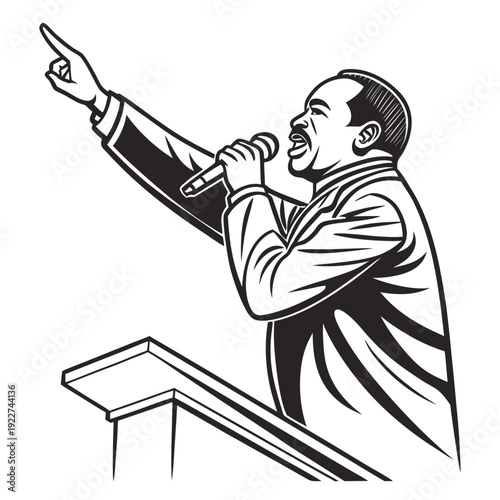 A man in a suit speaking into a microphone