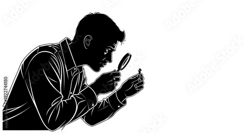 Man examining object with magnifying glass closely.