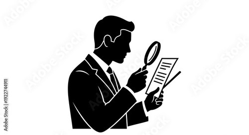 Man in suit examining document with magnifying glass closely.