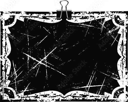 Black distressed grunge vintage frame with decorative corners and binder clip