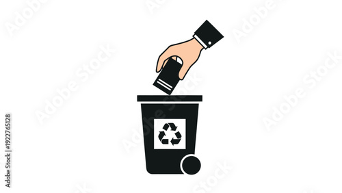 A persons hand deposits a rectangular item with stripes into a black recycling bin displaying the universal recycling symbol, representing waste management, environmental responsibility,