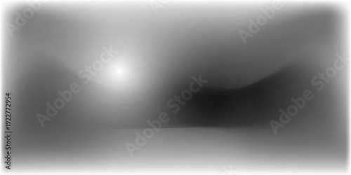 the black and white background with lighting resembles an empty studio similar to a barren desert