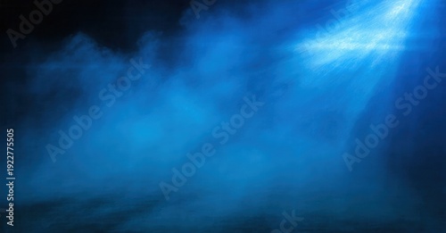Blue underwater scene. Light beams penetrate dark depths, creating ethereal atmosphere. Water swirls, suggesting movement, mystery.