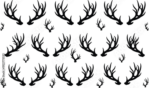 Collection of black deer antler silhouettes in various sizes and shapes for hunting club logos or rustic nature decor.