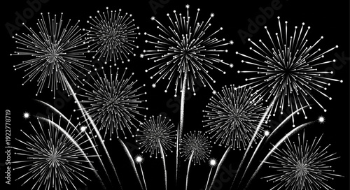 Spectacular fireworks display illuminating the night sky with vibrant bursts of light and color.