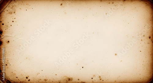 Vintage aged textured parchment paper background with grunge stain and distressed weathered effect