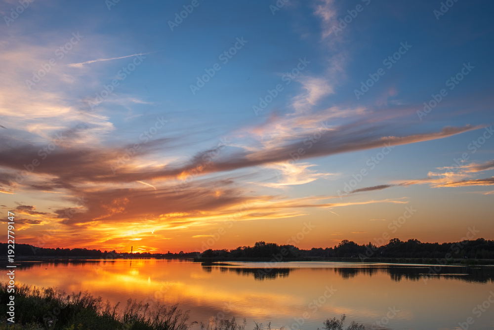 Fototapeta premium sunset over the lake