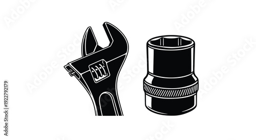 A black and white illustration of a wrench and a socket tool