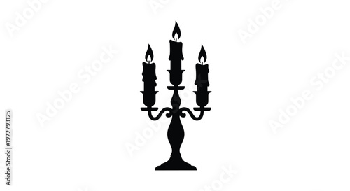 Black silhouette of a three candle candelabra on a white background