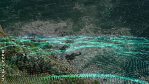 Breaking waves starting cyan dotted grid sweeping over rocky nearshore, showing surf patterns