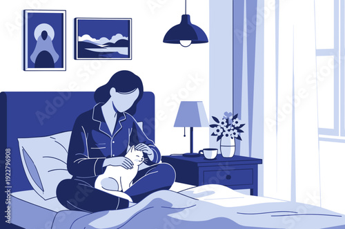 Woman sitting on bed wearing pajamas while cuddling cat indoors  