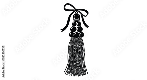 Black tassel with beads and a bow isolated on a white background