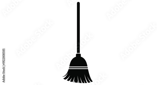 Simple black silhouette of a traditional straw broom on white