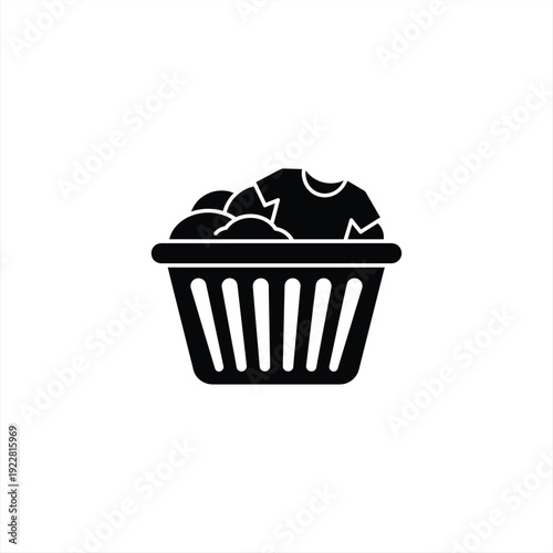 Illustration of dirty clothes in a laundry basket viewed from the front in a domestic setting