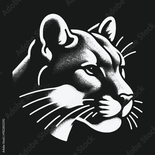 Intense Cougar Gaze: A Striking Portrait of Feline Focus.