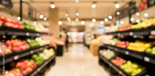 Wallpaper Mural Blurry view of a grocery store interior featuring fruit and vegetable shelves with various products organized neatly. The scene shows an inviting shopping environment. Torontodigital.ca
