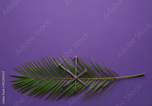 A single green palm frond on a purple background with a minimalist aesthetic.