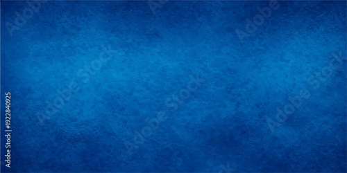 A vintage blue grunge texture background featuring a dark aged paint design on a rough canvas paper backdrop with subtle green light patterns and an old textured wall illustration