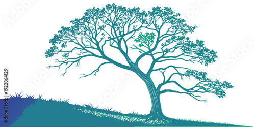 A serene tree standing tall amidst a lush green landscape under a clear sky