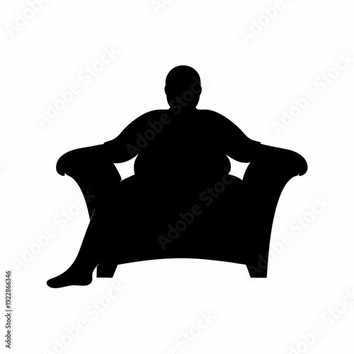 Silhouette of a Person Relaxing Comfortably in a Stylish Wingback Chair