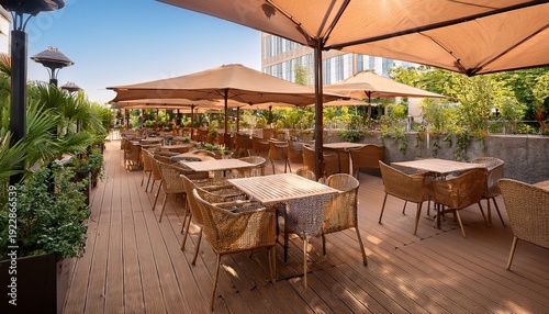 outdoor cafe terrace with modern furniture wooden tables woven chairs and large awnings