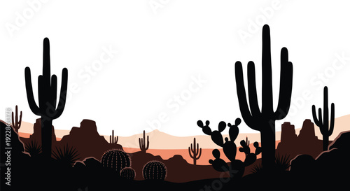 Silhouetted saguaro cacti and desert landscape at sunset