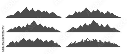 Set of black mountain range silhouettes isolated on white background for outdoor adventure design elements