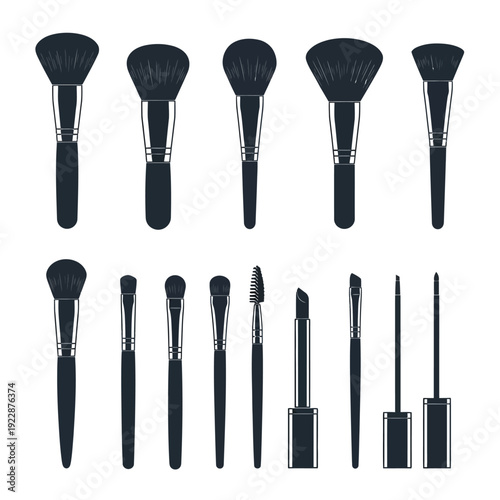 Collection of black makeup brushes arranged in neat rows and columns