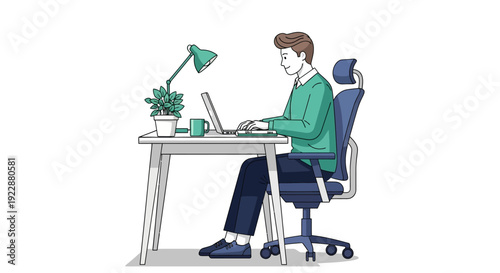 Young professional working diligently at modern office desk with laptop