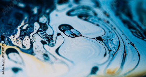 Swirl soap blur. Ink wave. Color pigment drop curl gasoline flow. Blue white yellow oil liquid stream abstract background texture.