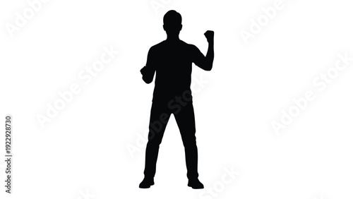 Silhouette of a man with his fist raised in a gesture of triumph or celebration
