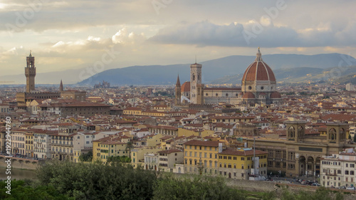 Panoramic view of Florence, Italy, at sunset. Famous view on Firenze and Santa Maria del Fiore Cathedral from the Michelangelo Square (Piazzale Michelangelo) in Florence, Tuscany, Italy