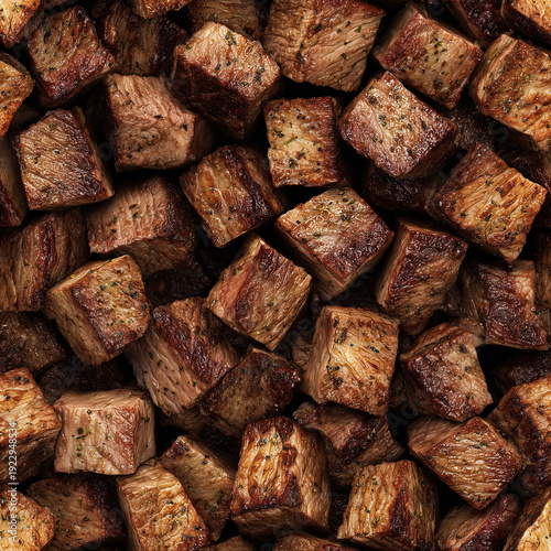 Seamless pattern of piled cubed cooked beef for infinite repeating backgrounds or textures