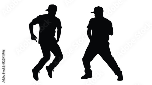 Silhouettes of two men in dynamic poses potentially dancing or performing
