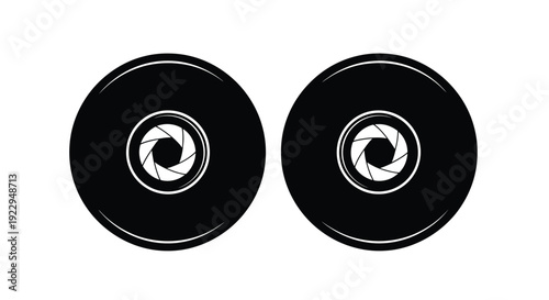 Two circular camera apertures with detailed iris mechanisms displayed prominently