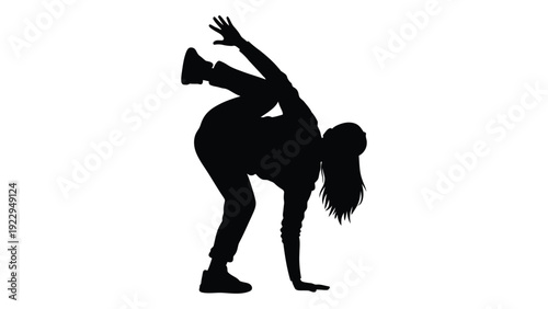 Silhouette of a woman performing a handstand against a white background