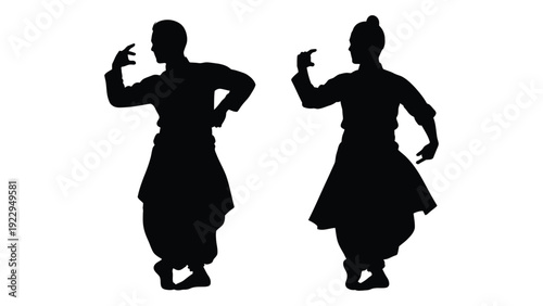 Silhouette of two kathak dancers performing a traditional indian dance