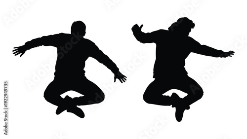 Two silhouettes of people jumping arms outstretched captured in a dynamic pose