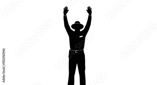 Man celebrating success with arms raised in modern office