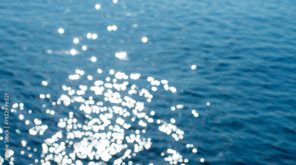 Fototapeta premium Lights on sea background. Waves.