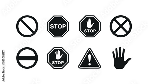 Set of eight black and white prohibition and warning signs including stop hand and exclamation mark