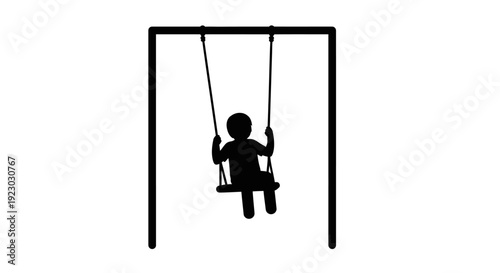 A child plays on a swing set outdoors byo
