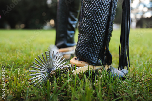 Close-Up of Huaso Spurs and Leather Leggings