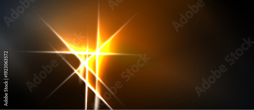 Bright light burst radiates from center. Orange, yellow hues dominate dark background. Sharp lines create star effect. Dramatic illumination.