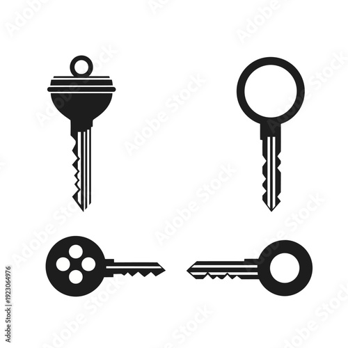 Set of four different keys on a white background viewed from directly above